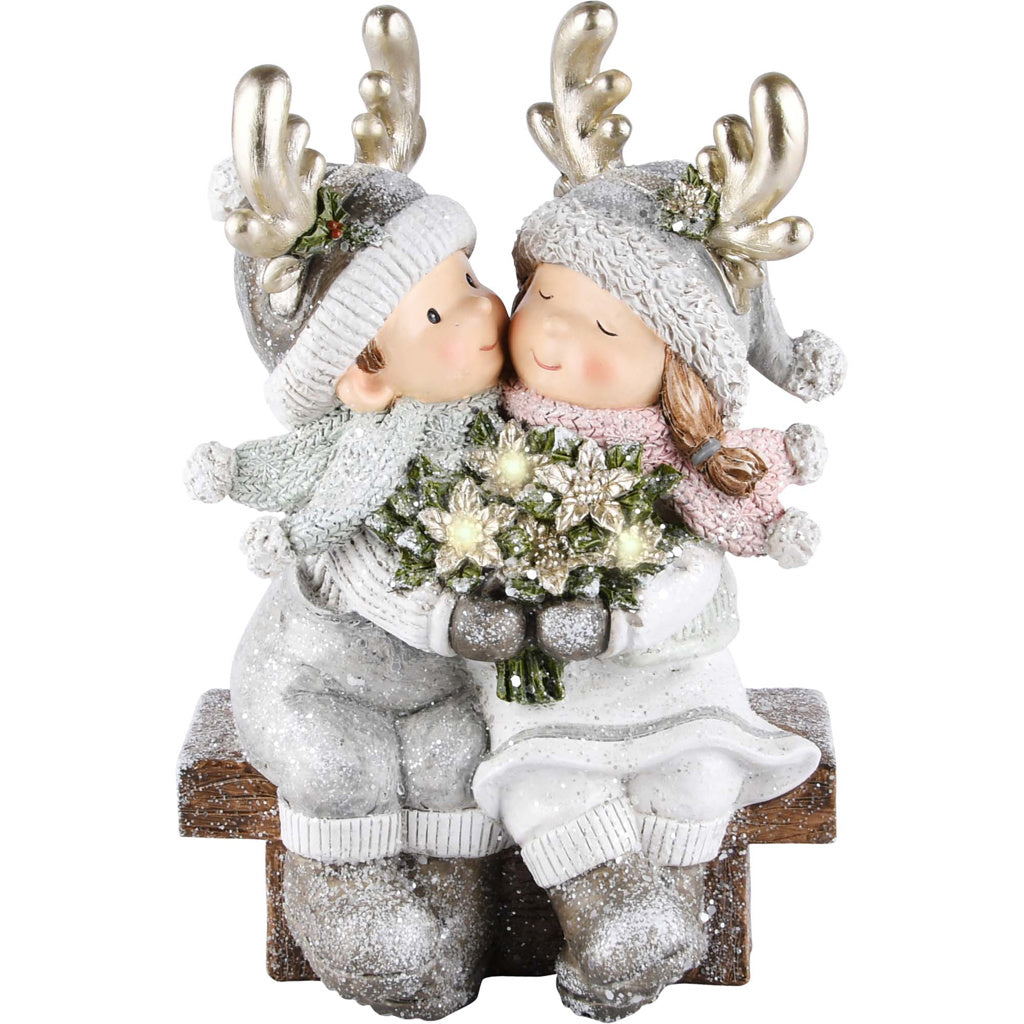 Kerstkindjes op een bankje