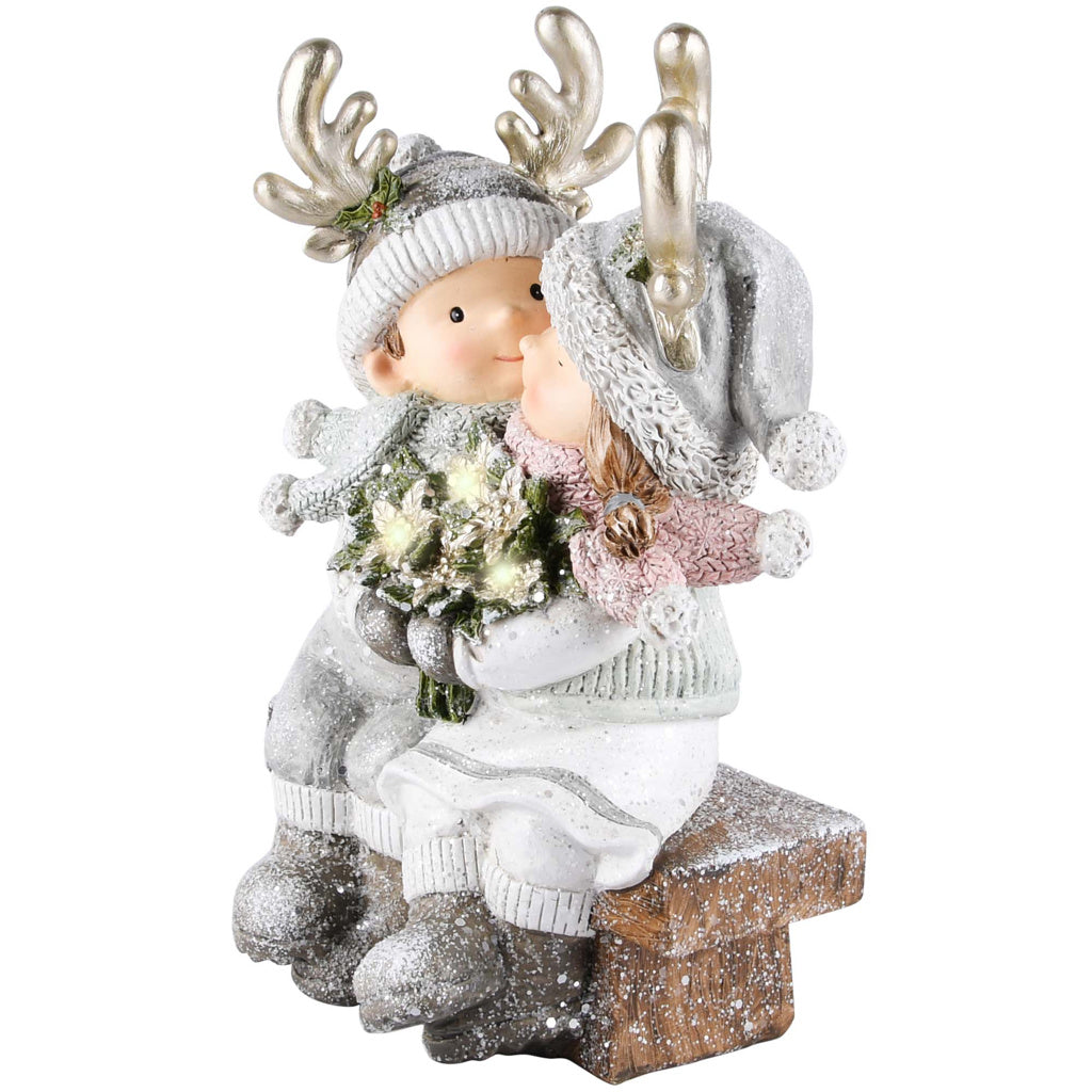 Kerstkindjes op een bankje