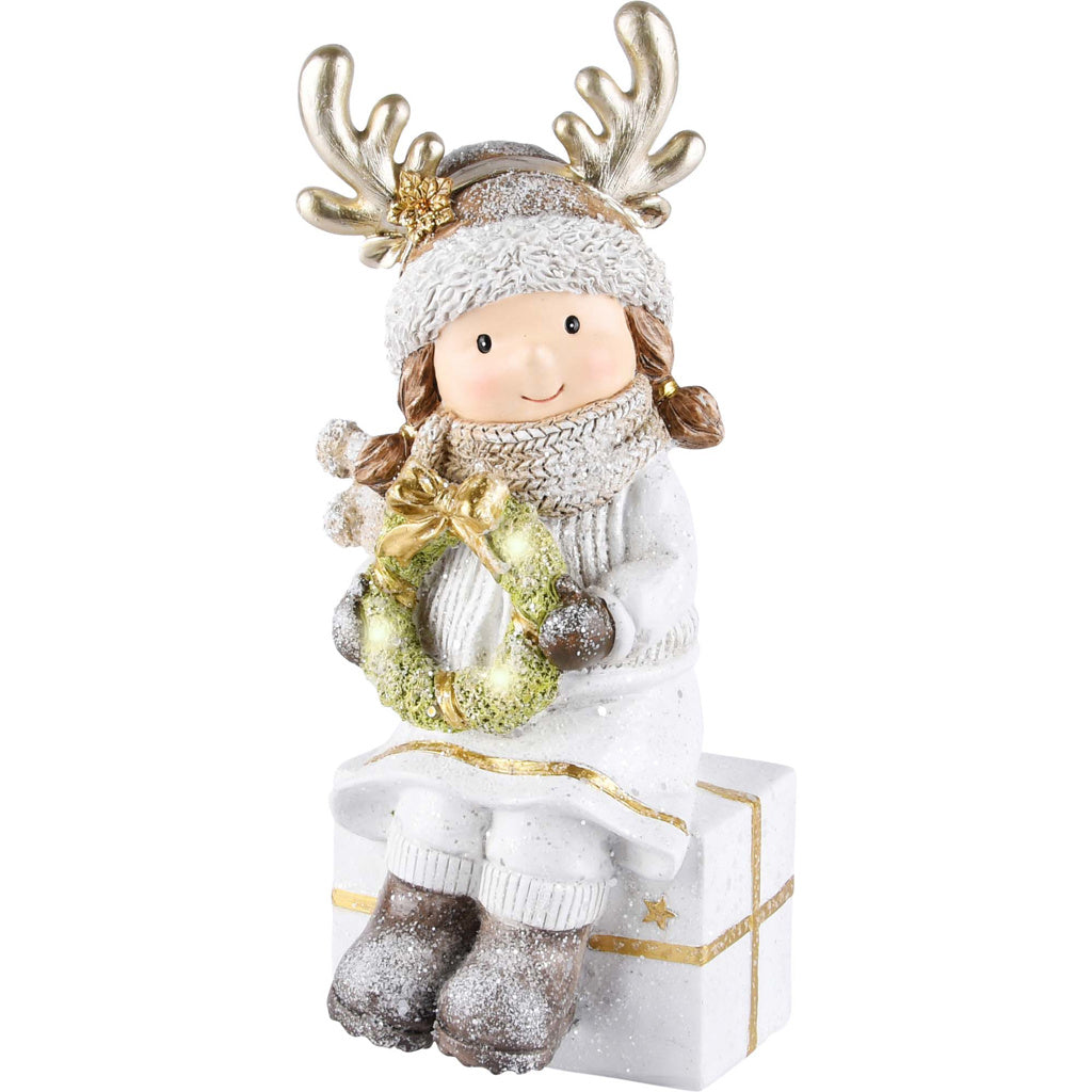 Kerstkindje op een cadeautje